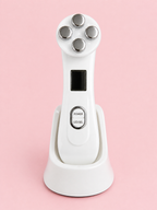 The Solwynn Contour standing upright in its white charging base, seen from the front.