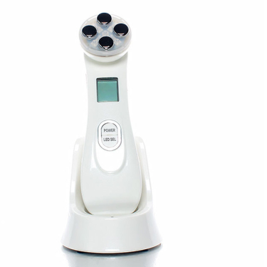 Solwynn Contour facial device resting upright in its charging base on a bathroom counter